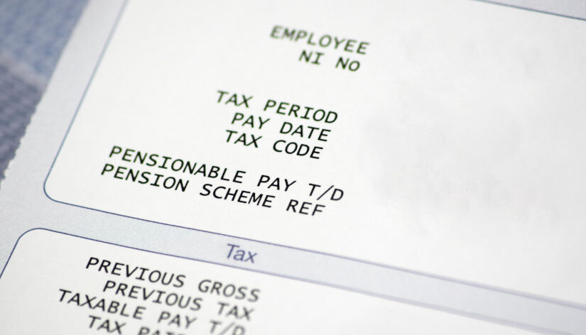 Photograph of a paper pay slip. Photo: tattywelshie / Getty Images